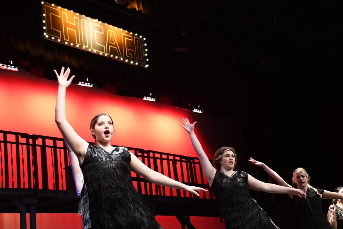 Aimar Romero (9), Lila Scrivner (11) and Karly James (11) preform "Cell Block Tango." Chicago was originally set to premiere Jan. 23, 24 and 25 after it was postponed to Jan. 30 and 31 and Feb. 1.