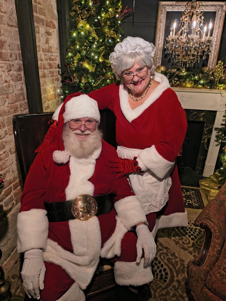 Mr. and Mrs. Claus greets children at the Windsor Hotel during the Yuletide. They will return for events on Dec. 13 and 20.