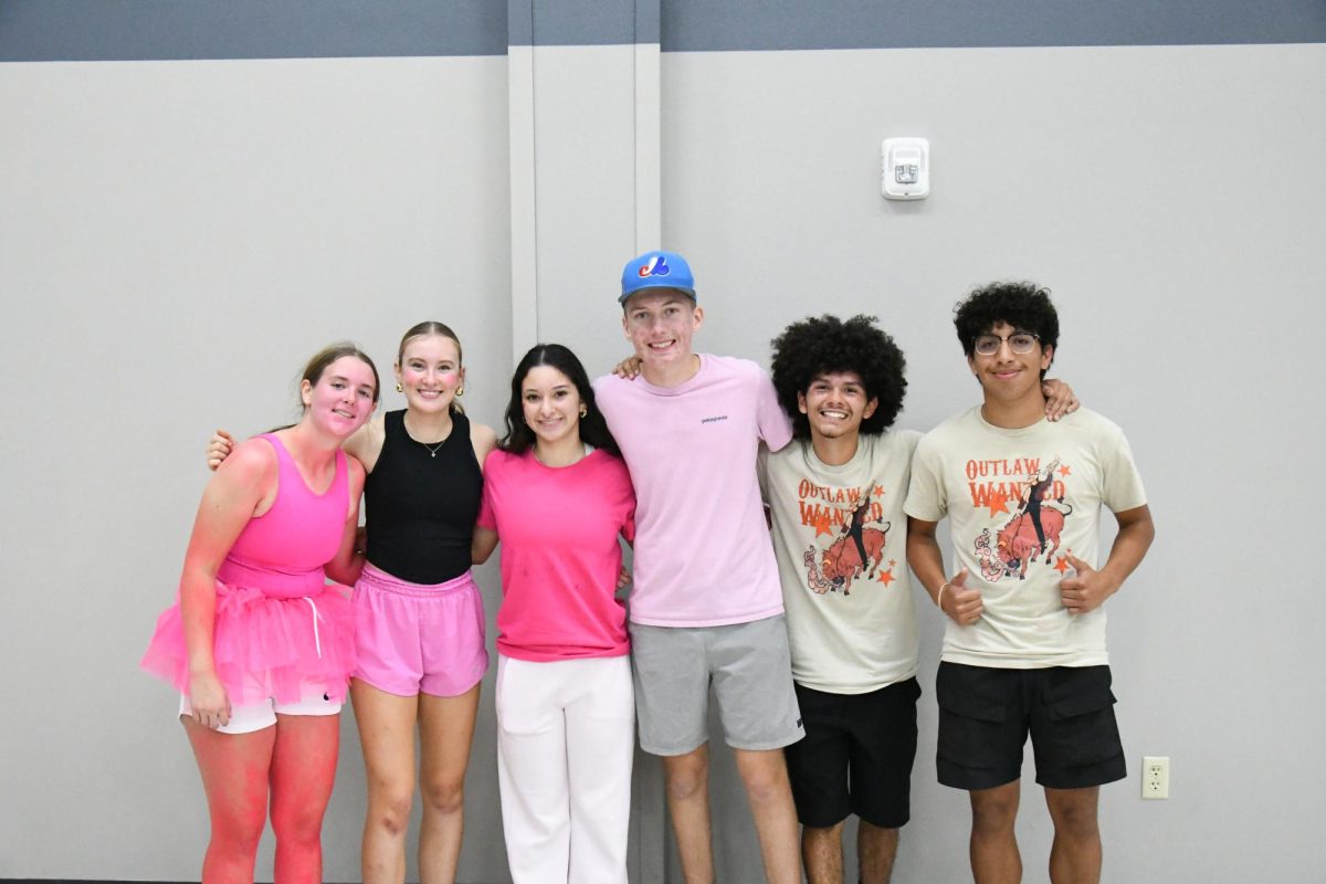 FCA Leaders Lily Koksal (11), Natalie Brown (11), Diana Olivas-Reyes (11), Eli Steinmetz (12), Eleazar Sanchez (12) Achilles Martin (12) gather at fifth quarter friday.
