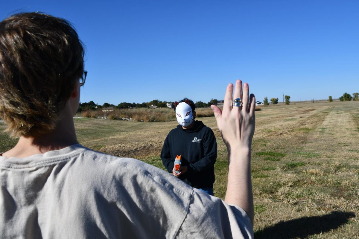 Robert Ryman (12) is eliminated while participating in Senior Splashin’ by Eduardo Zamarippa (12). Zamarippa wore the mask for game protection.