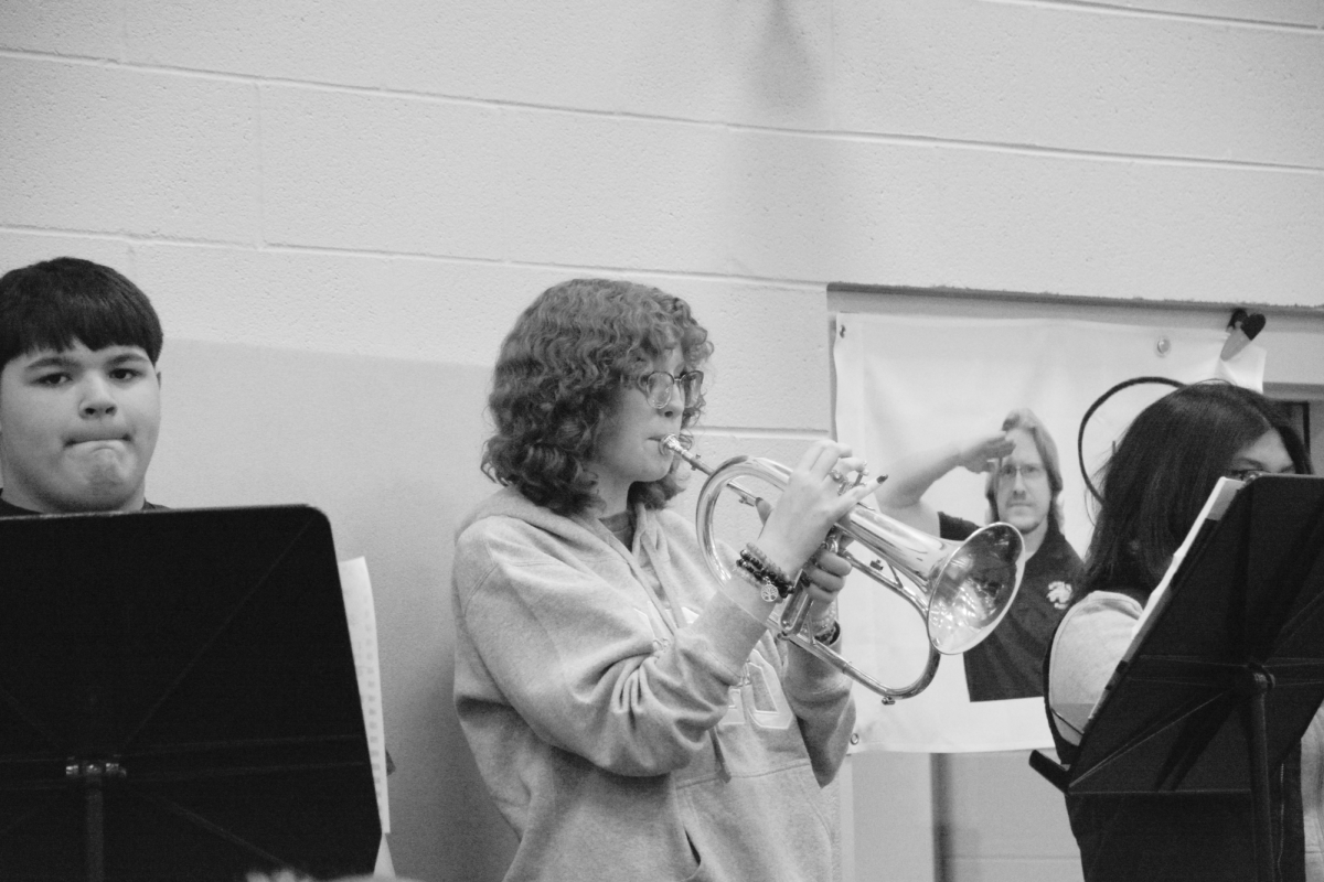 Emily Smith (12) in GCHS Band room practicing trumpet during Jazz I. She rehearses for concert songs and pieces for competition.